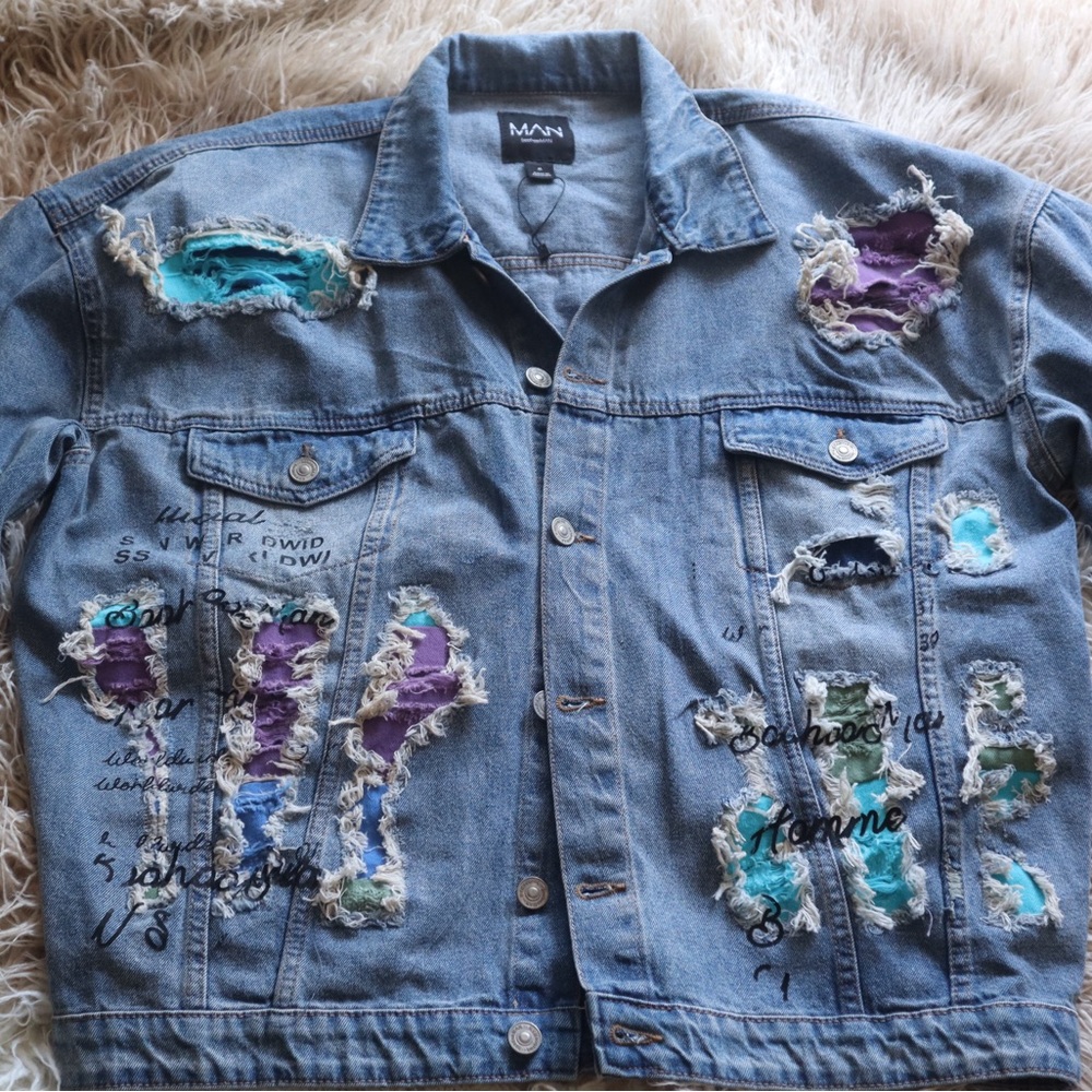 Distressed Denim Jacket with Colorful Patches
